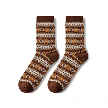 Pair of brown and beige patterned socks on a white background