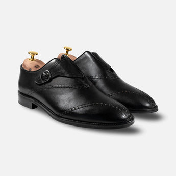 Handcrafted black single monk strap shoes for men — Sovereign model in full-grain leather with Goodyear welt construction.