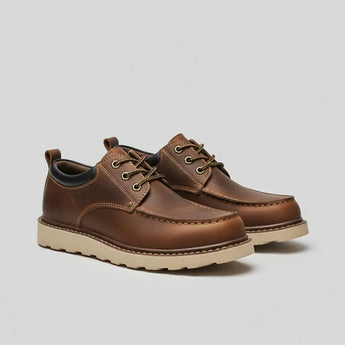 Vintage Crazy Horse moc toe leather boots in brown with Goodyear welt and wedge sole.