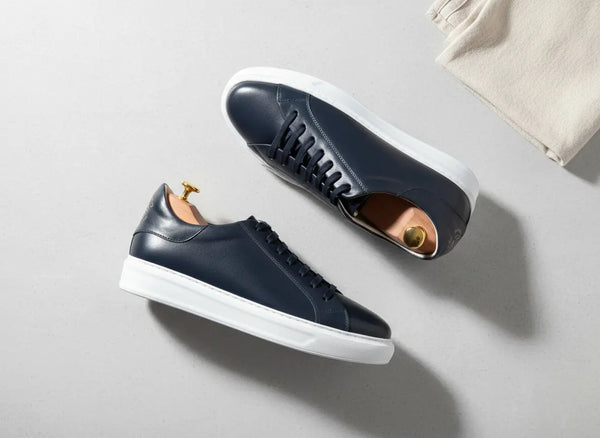 Elegante dark blue leather sneakers — close-up of smooth grain, hand-finished details by Shoescoo
