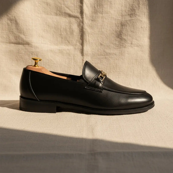 Side profile of Legacy Loafer Black – premium men’s black leather horsebit loafers with polished finish