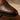 Handcrafted brown leather oxford shoe cap toe detail.