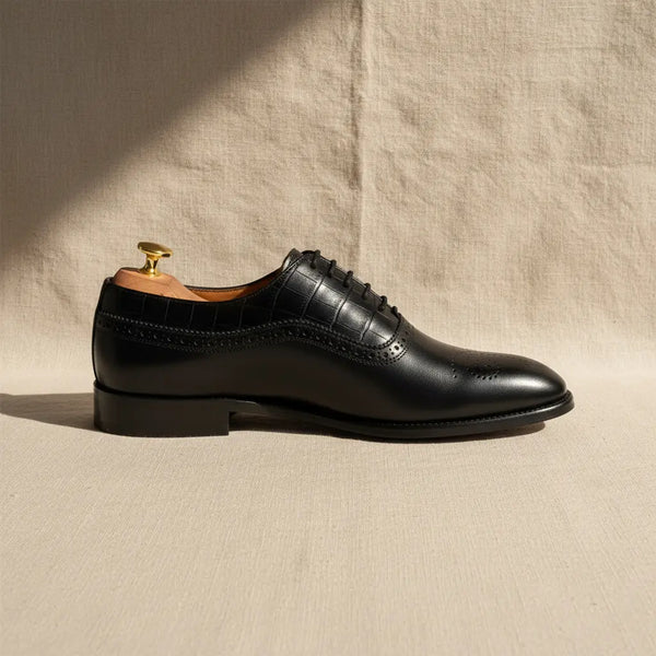 Marquis Oxford Black product shot on linen background – handcrafted black leather Oxford shoes for men.