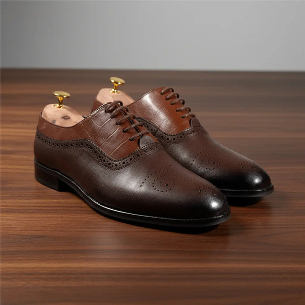 Close-up of Marquis Oxford in brown showing full-grain leather texture and hand-polished finish.