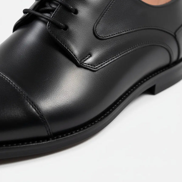 Goodyear welt profile of the Regal Derby black leather derby shoes for men—comfortable dress shoe design.
