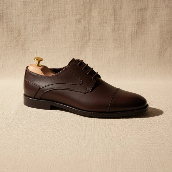 Side view of Regal Derby — polished brown leather derby shoes ideal for formal and evening occasions.