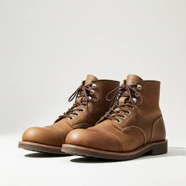 Men’s brown crazy horse leather 8111 boots with cap toe and lugged sole on #F2F2F2 background