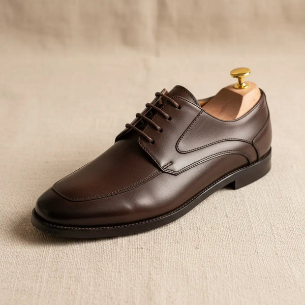 Single Summit Derby shoe on a neutral background — elegant men’s brown dress derby shoes with clean lines and polished finish.