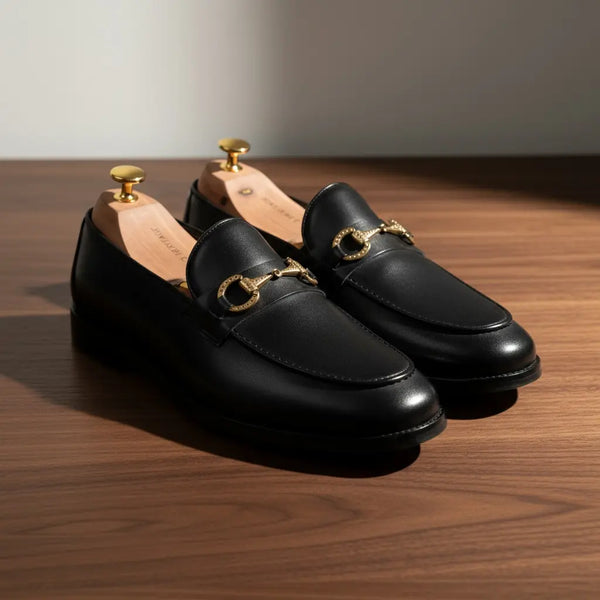 Close-up of Vanguard Black leather loafers — full-grain leather texture, luxury dress loafers for men.