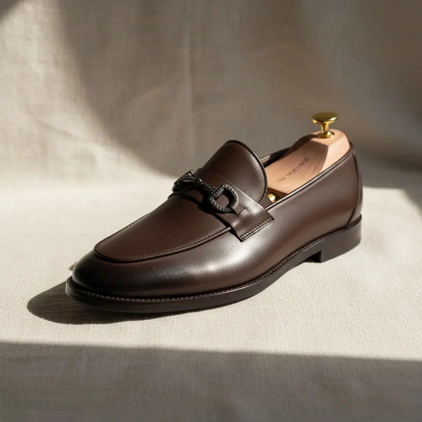 Evening light on Vanguard brown dress loafers — refined classic men’s leather loafers.